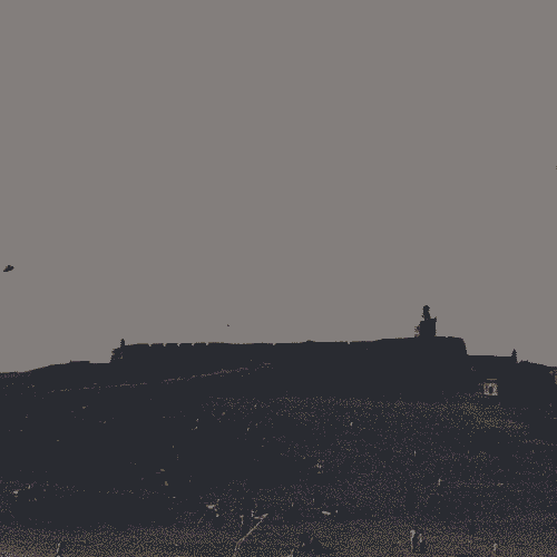 El Morro's grass yard on a sunny day. This is a black and white analog photograph.